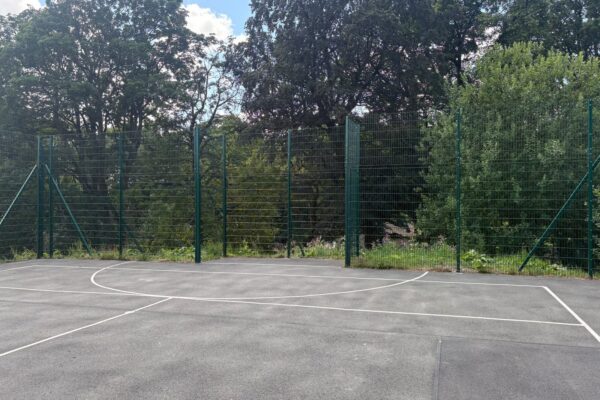 Completed mesh fencing to a multi use games area at a school in Keighley, raised to 3.6 metres on one side